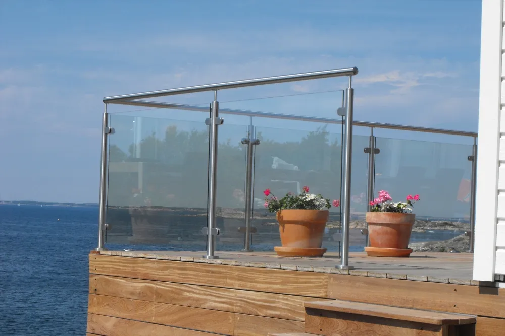 Aluminiium balustrades with a glass fence on a balcony by the ocean
