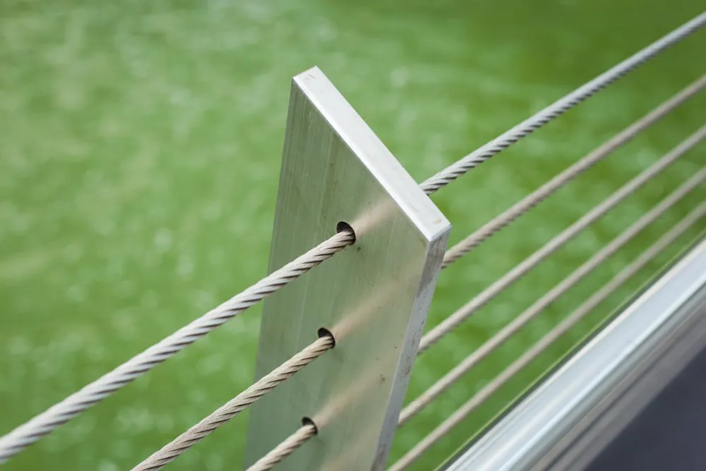Aluminium Fence Pole With String Barricade Just Above The Green