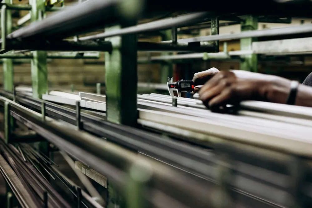 Structural aluminium pipes stored on warehouse shelves