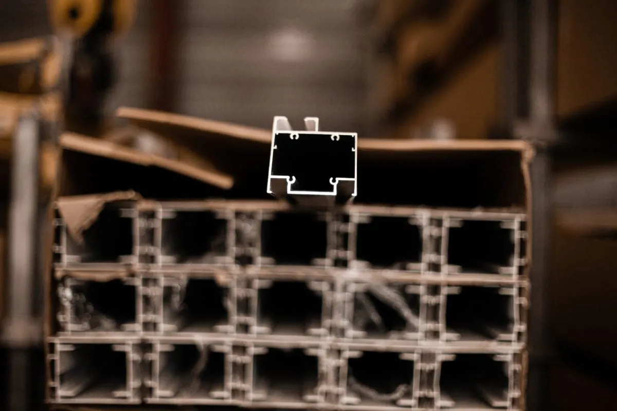 Aluminium extrusion profiles stacked in a supplier warehouse